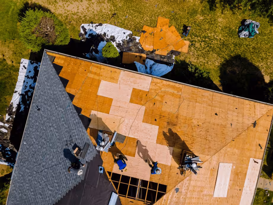 Trusted Markham roofers performing attic ventilation upgrades during a complete roofing system installation.